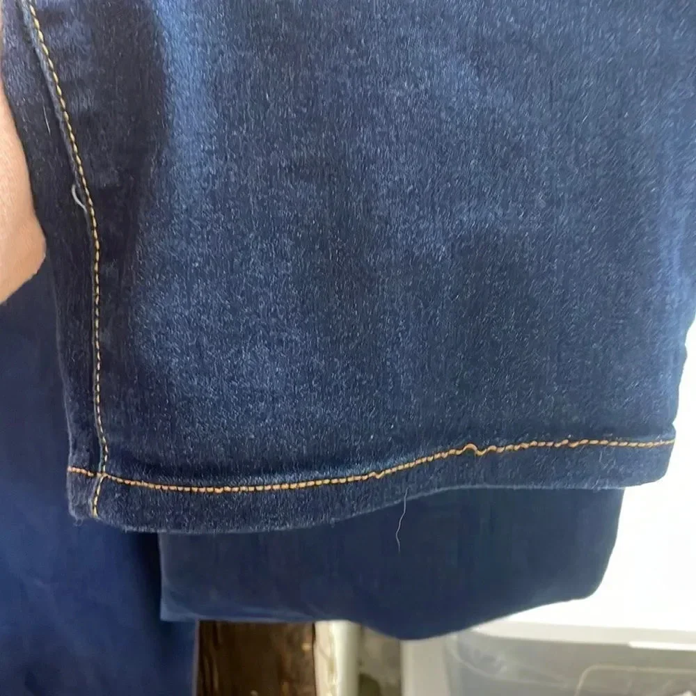 Michael Kors woman’s dark blue jeans. They are a size 10